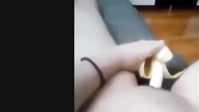 Solo Asian teen with a banana